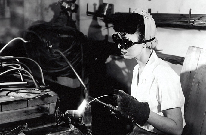 working with blowtorch during WWII